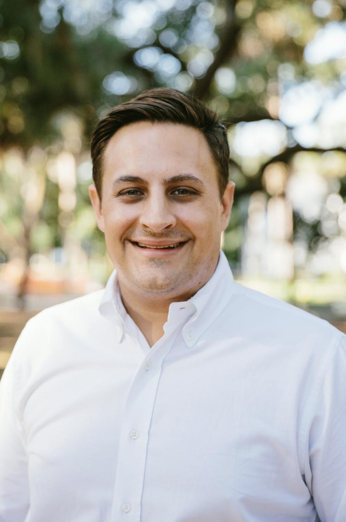 a man smiling for the camera
