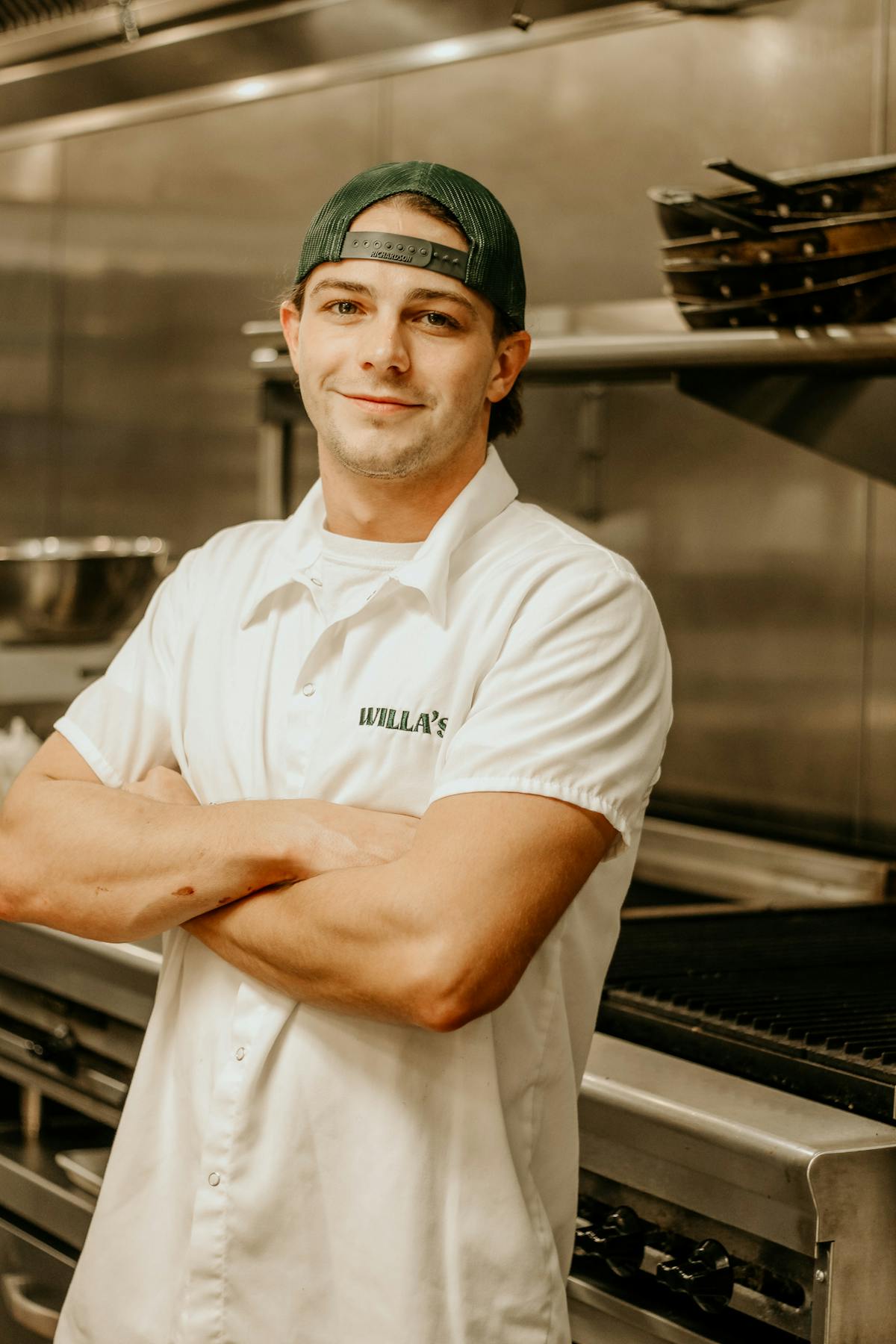a man standing in a kitchen
