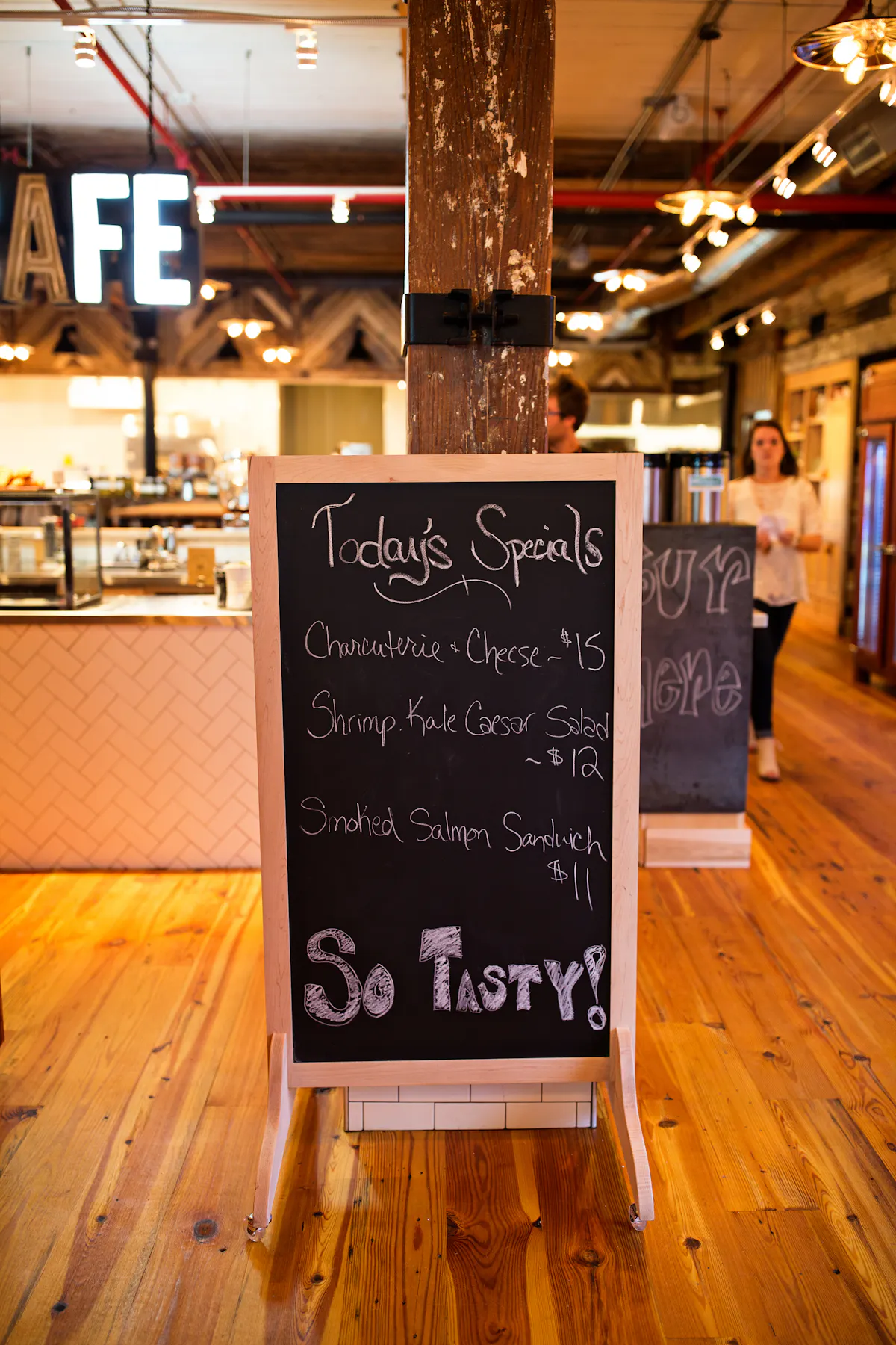 a sign on a wooden floor