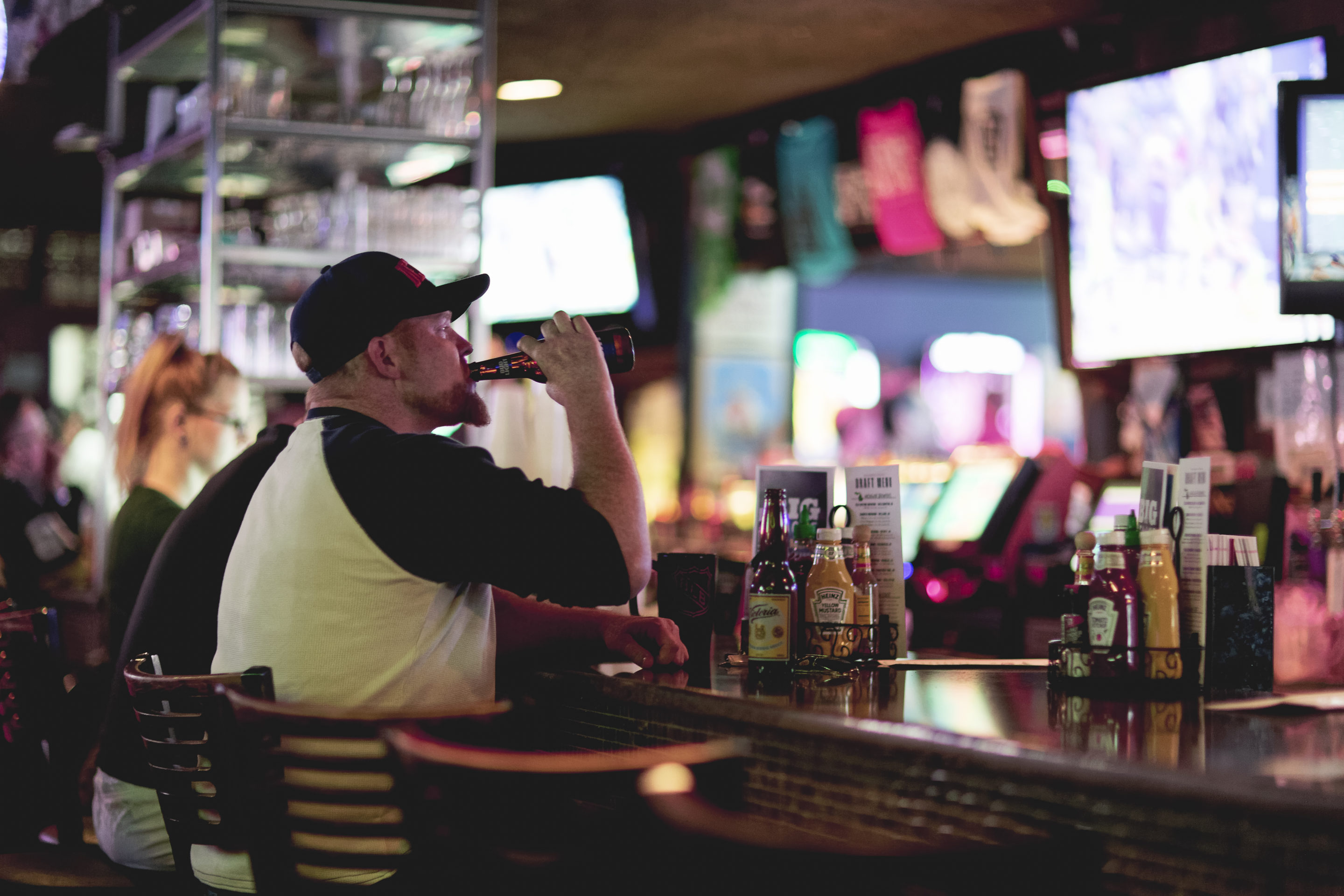 a man sitting at a table in a restaurant