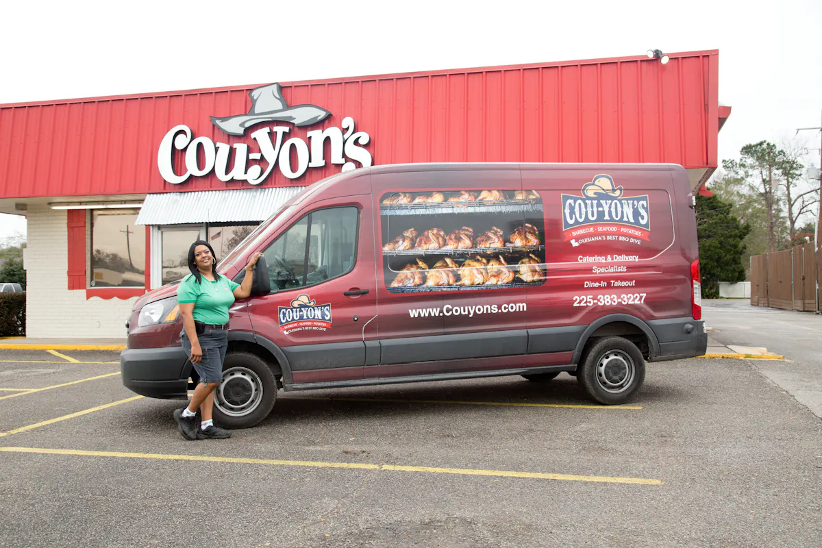 a truck is parked in front of a building