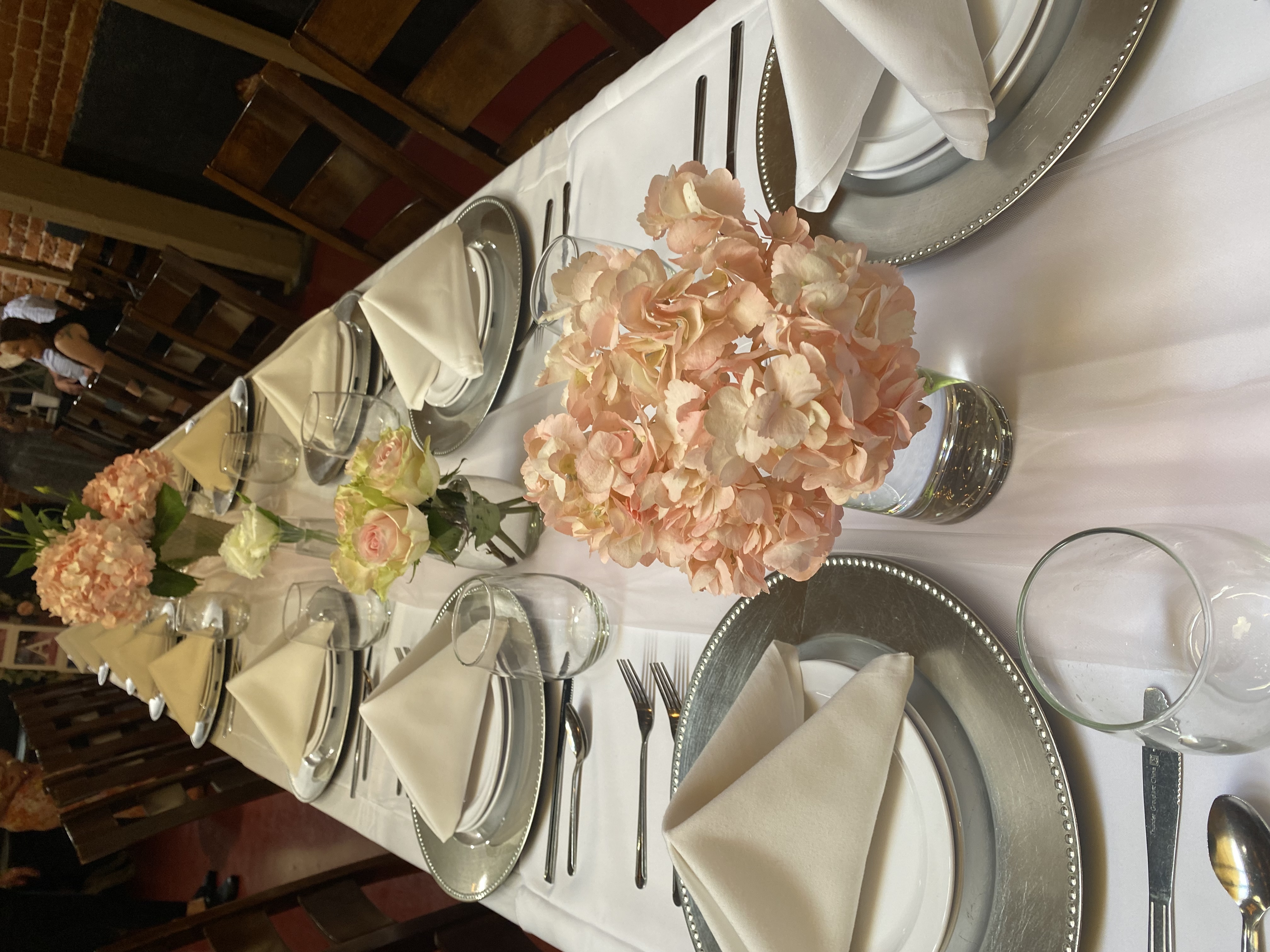 a dining table with a cake on a plate