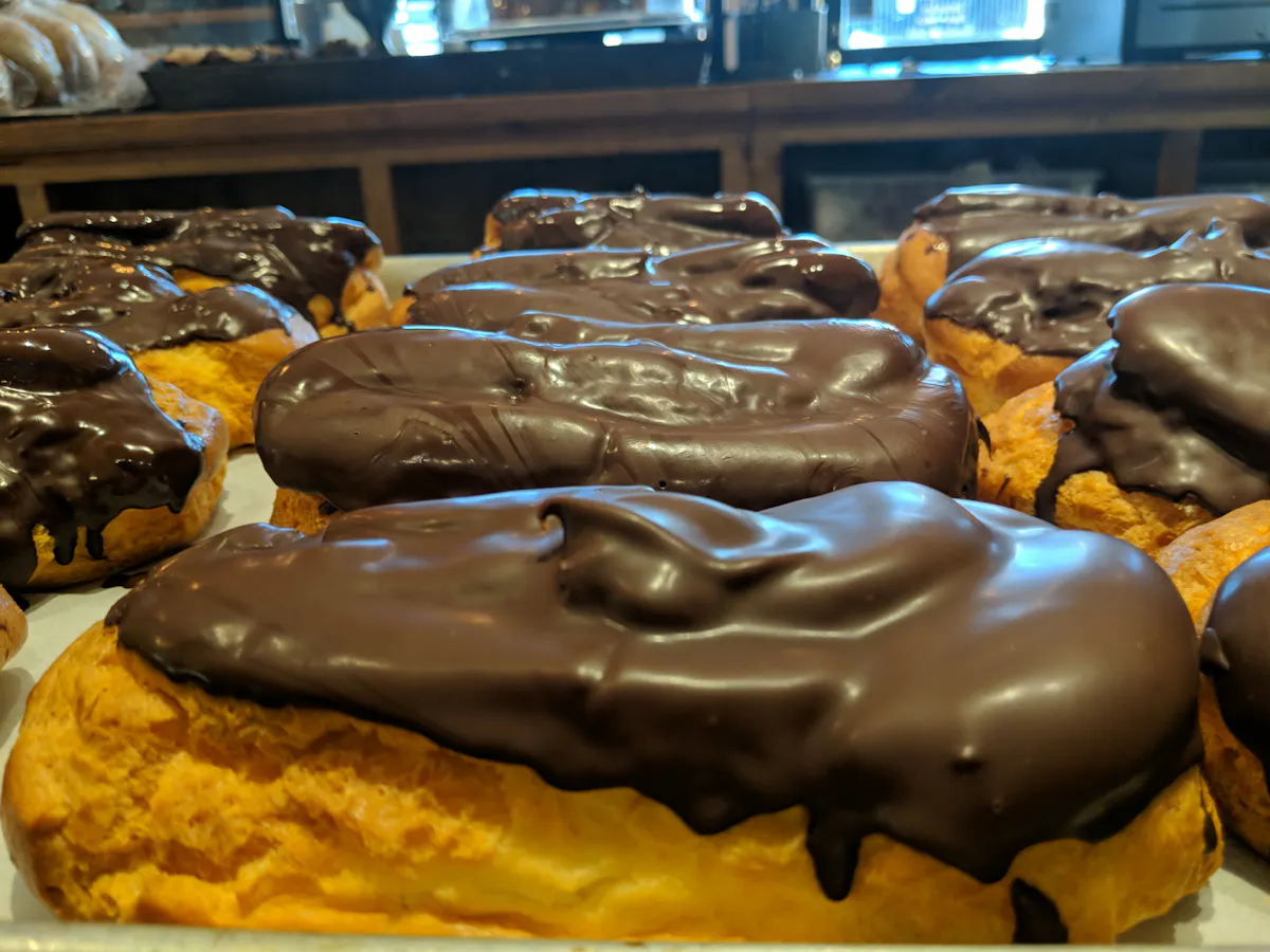 a large chocolate cake is on display