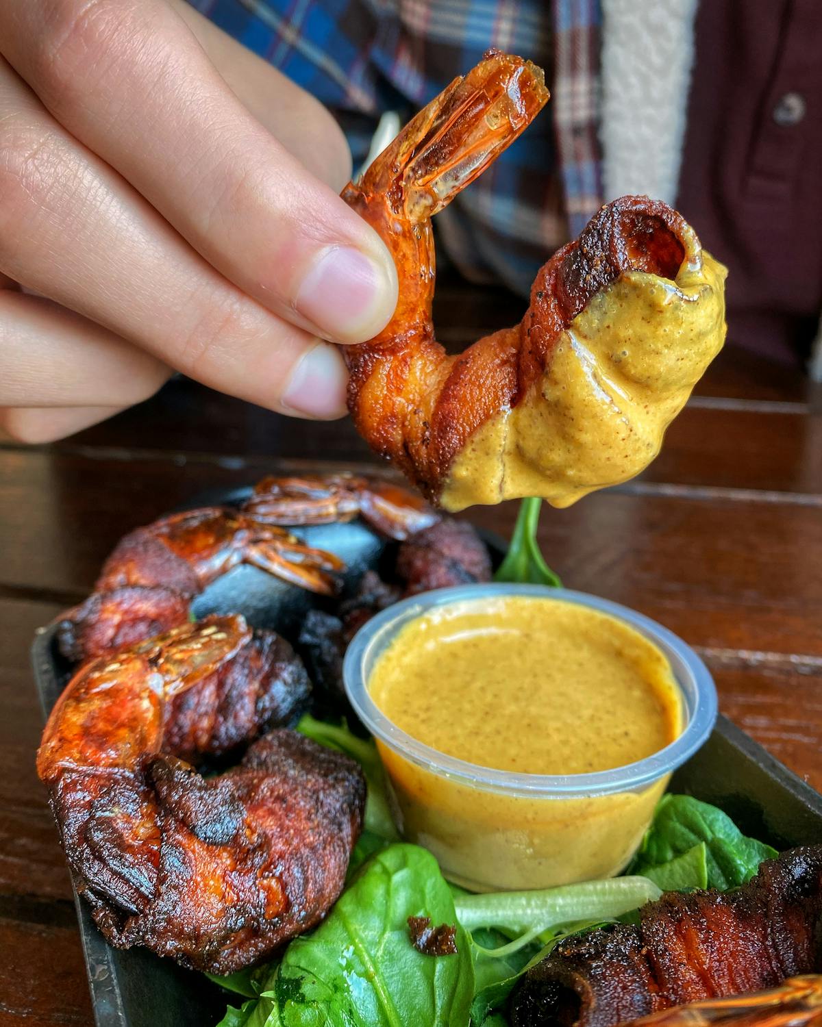 a close up of a person holding food