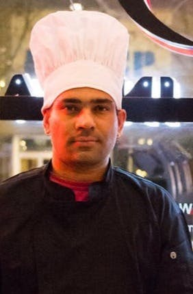 a man wearing a hat