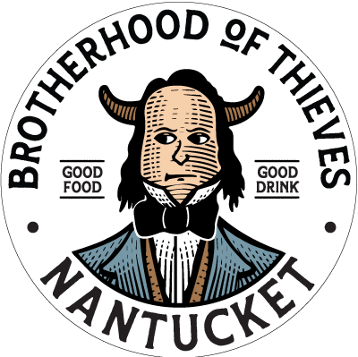 a round logo with a man with horns