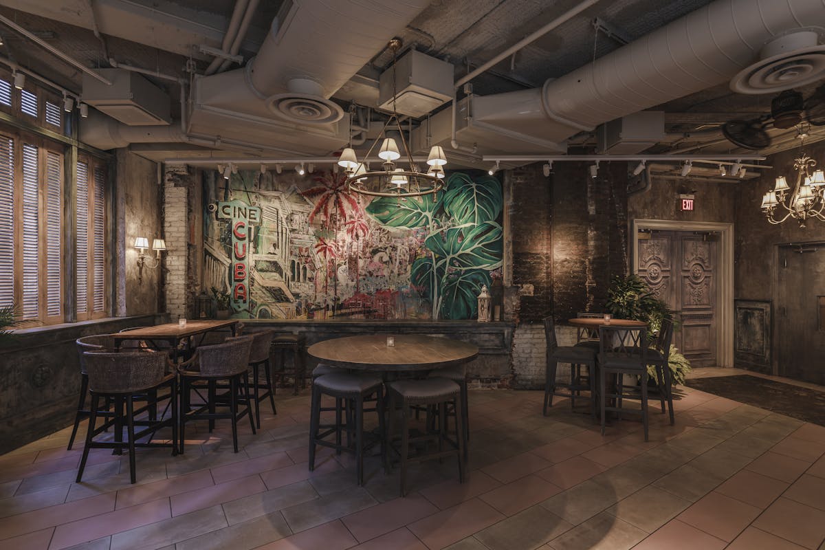 a room filled with furniture and a table in a restaurant