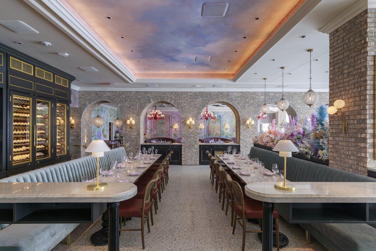 a dining room table in front of a building