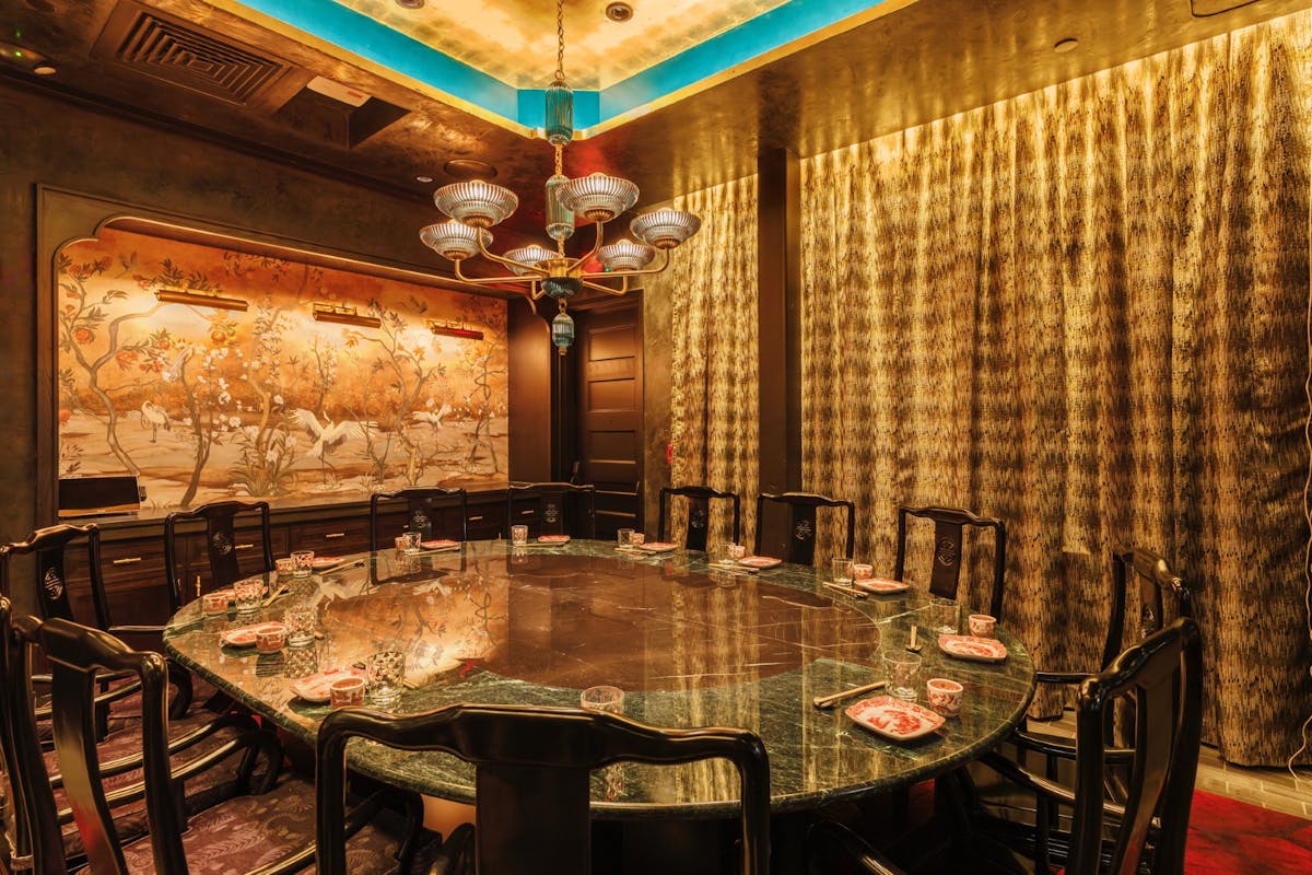 a large room with tables and chairs