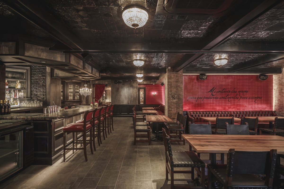 a group of people sitting at a train station