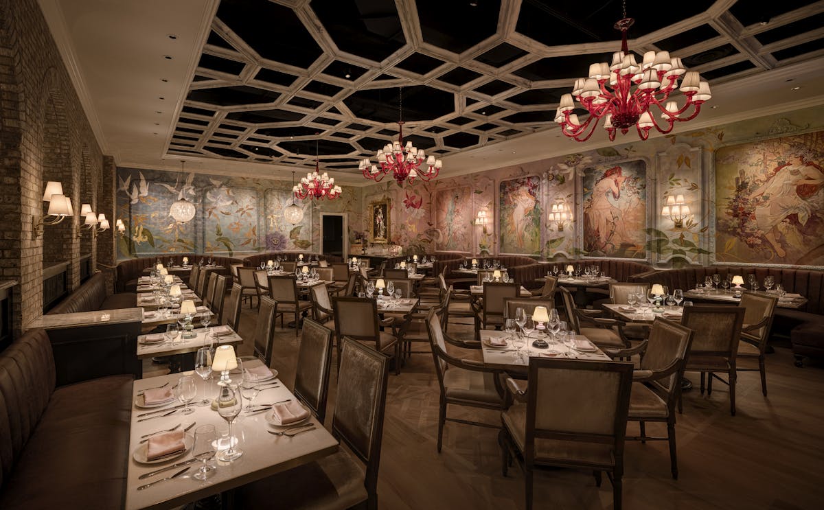 a room filled with furniture and a table