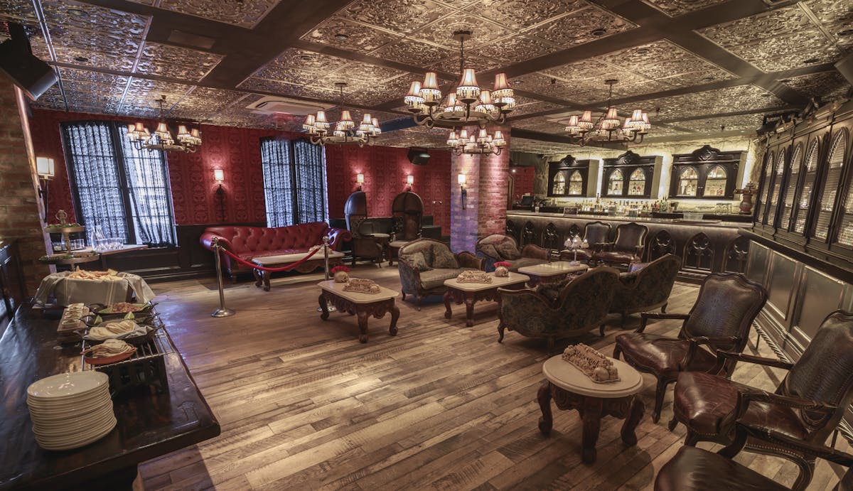 a living room filled with furniture and a fireplace