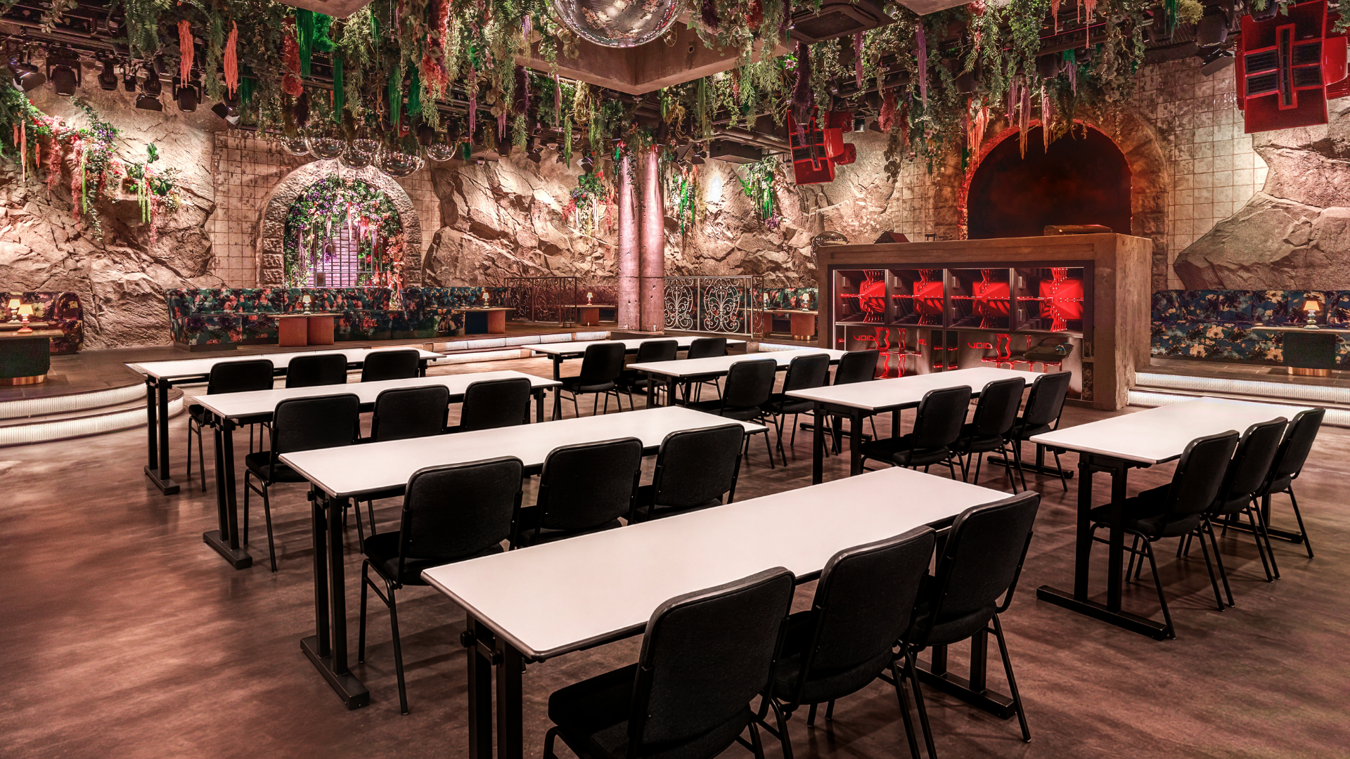 a room with tables and chairs