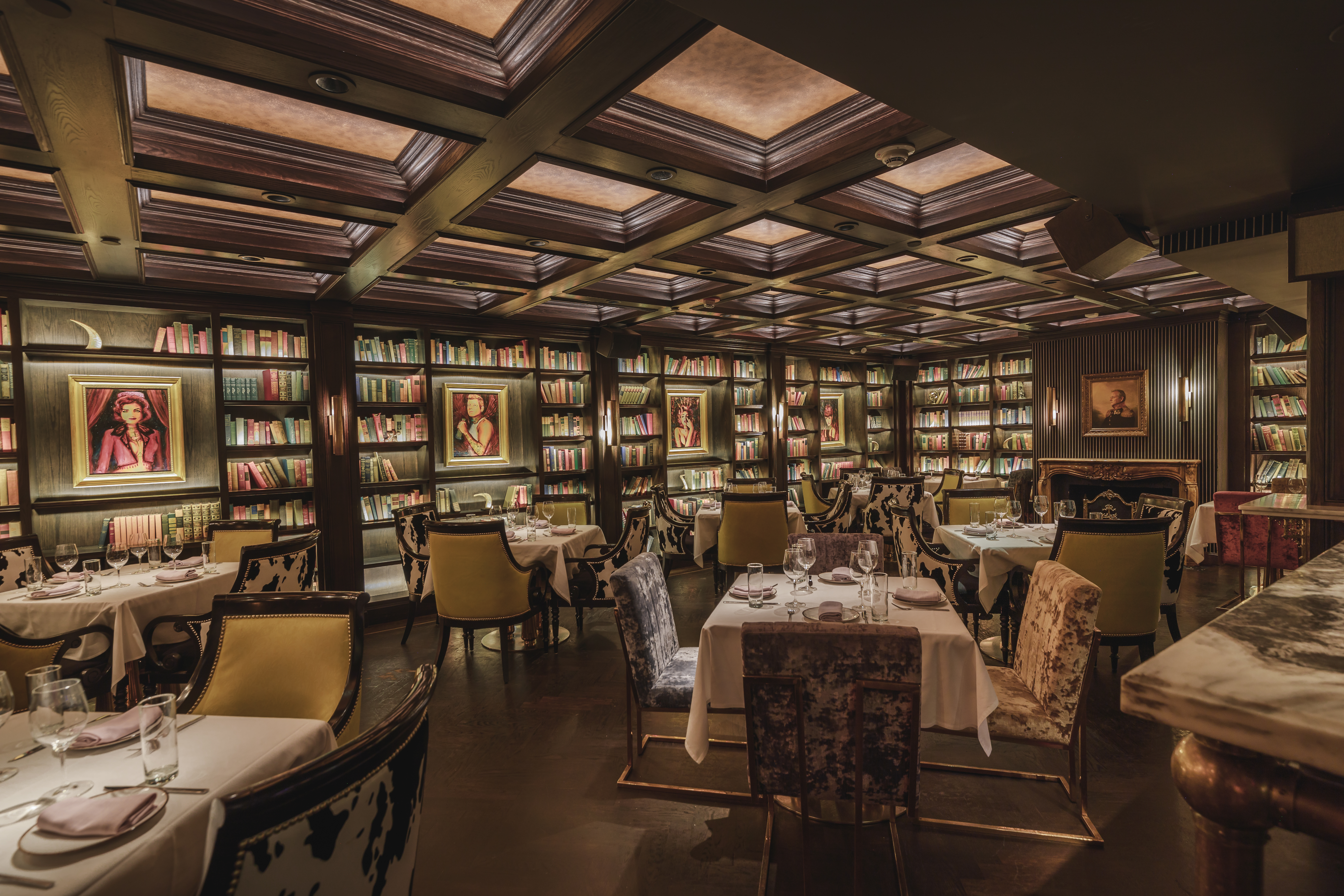 a room filled with furniture and a table