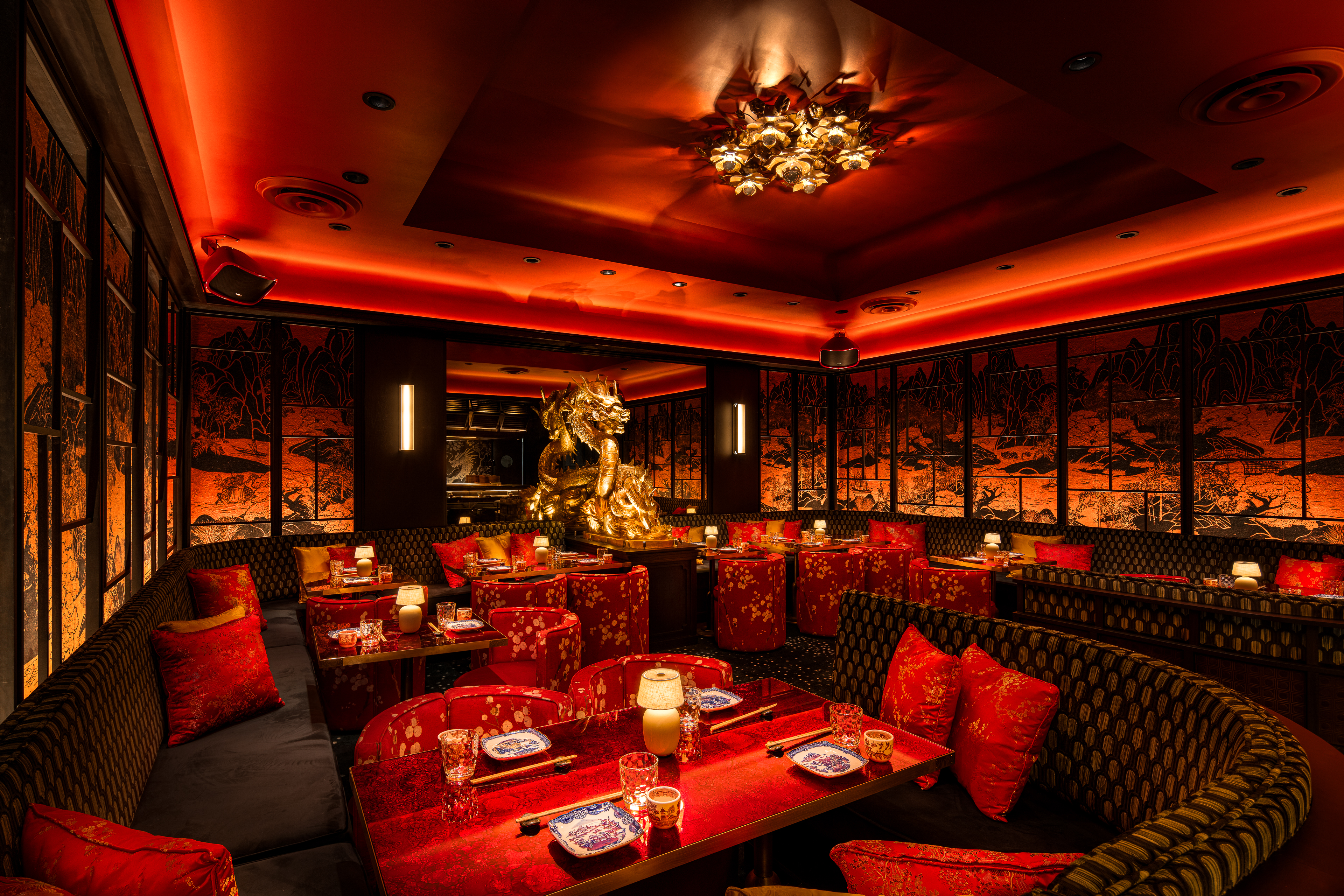 a living room filled with furniture and a fire place