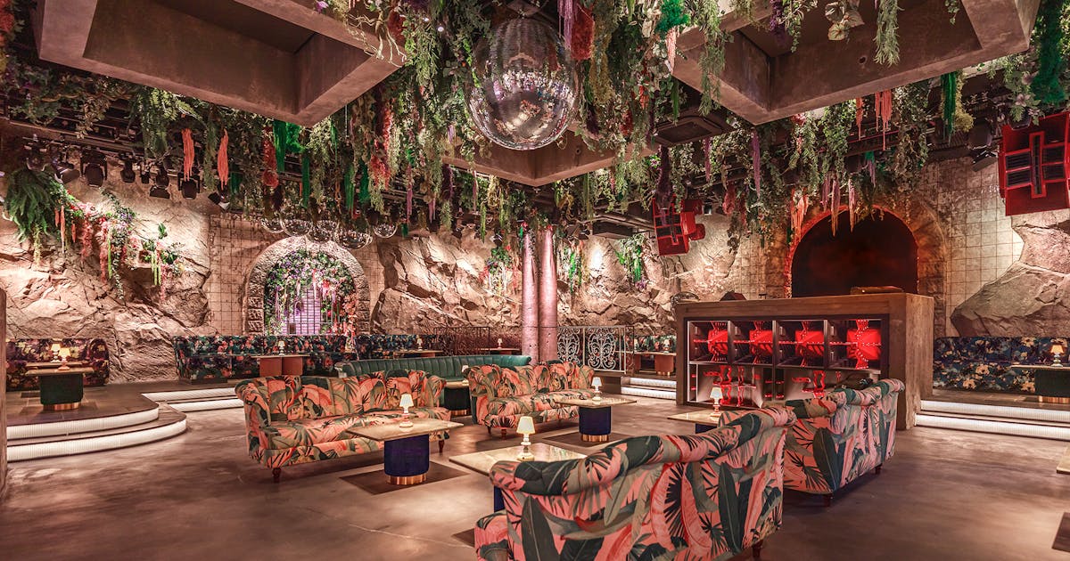 a room filled with furniture and a fire place