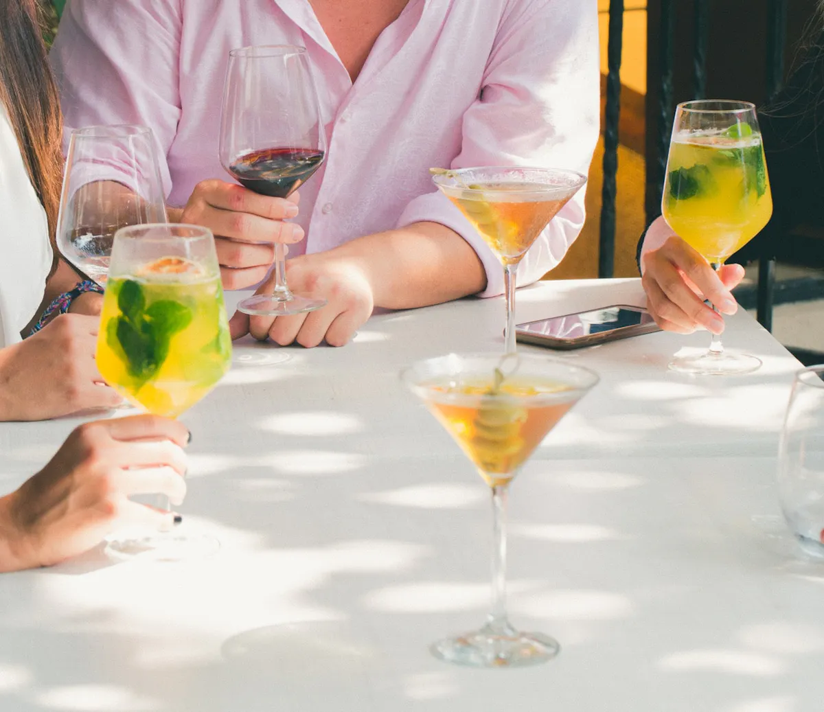 people drinking cocktails