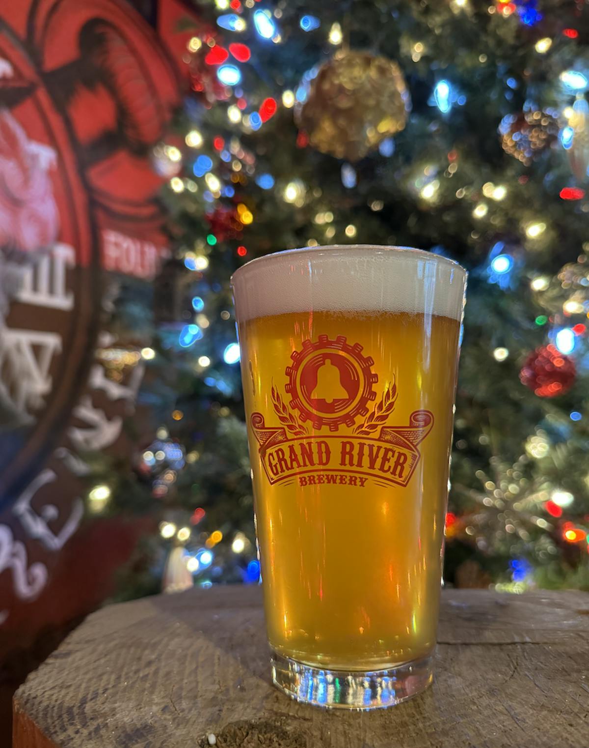 a close up of a glass of beer on a table