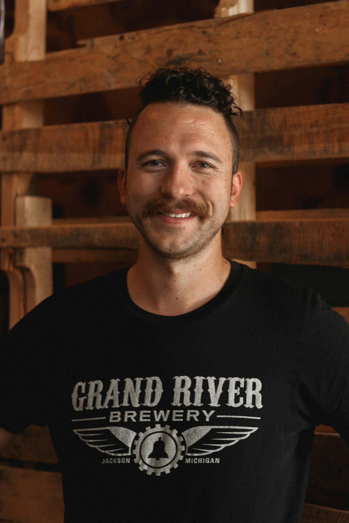 a man smiling for the camera