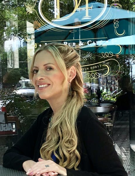 a woman smiling for the camera