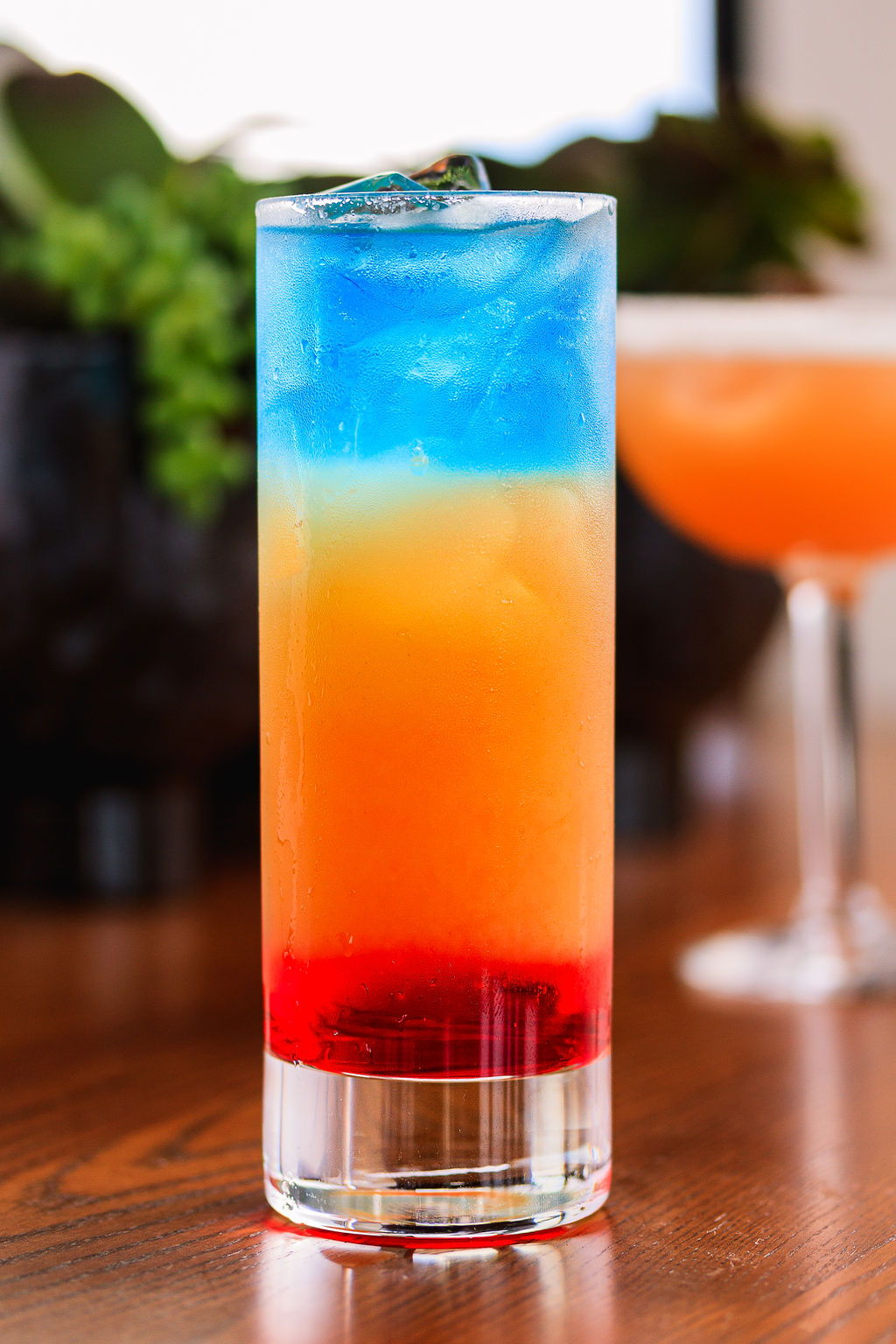 a close up of a glass of orange juice