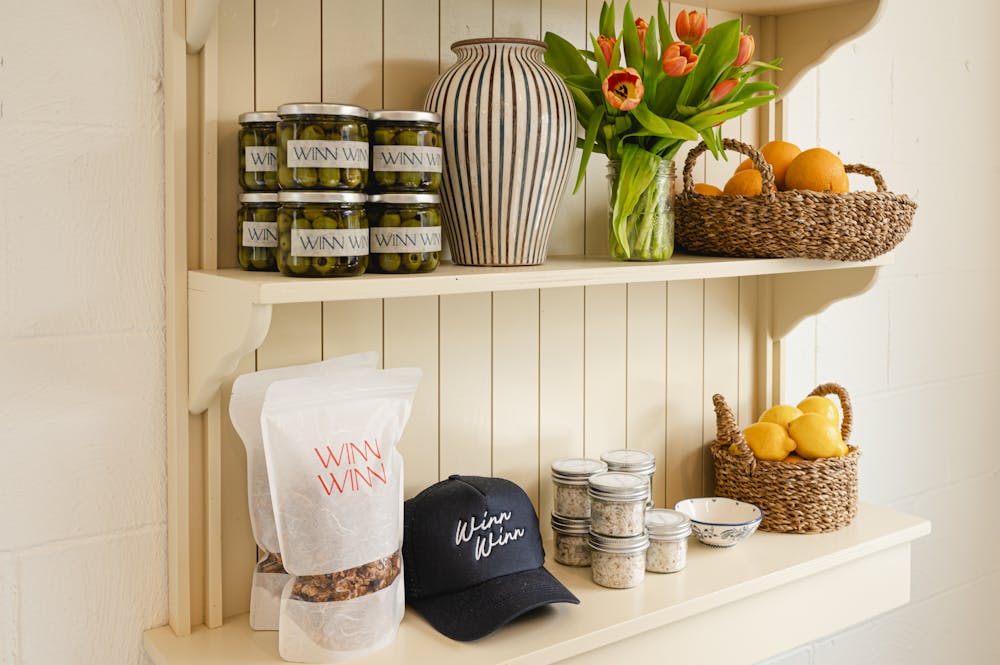 a vase of flowers on a kitchen counter