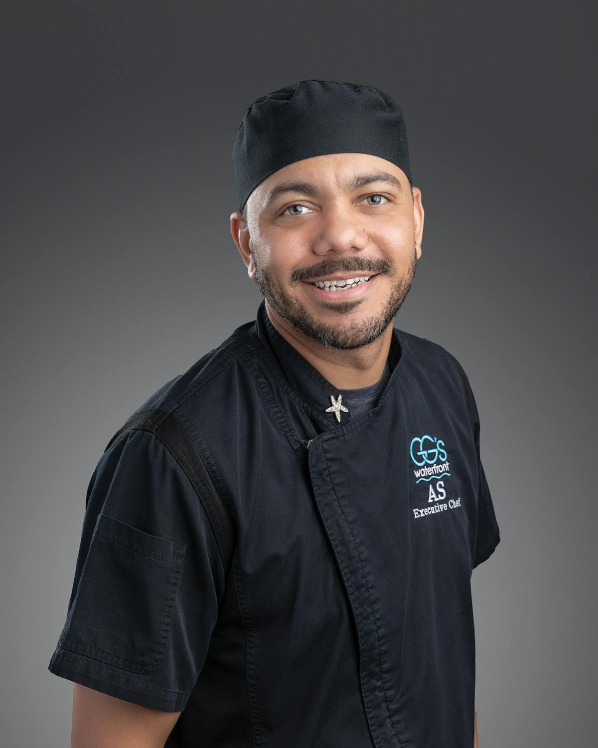 a chef smiling