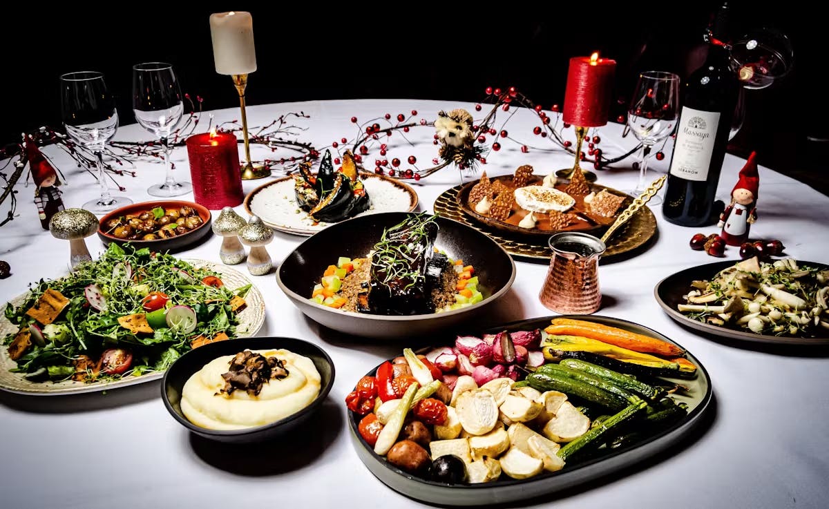 a table topped with plates of food on a plate