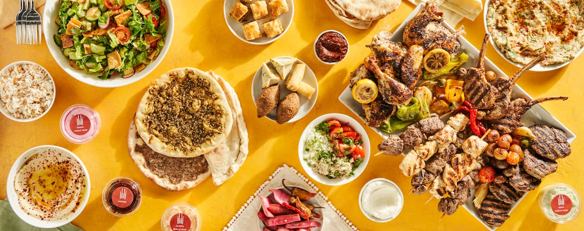 a bunch of different types of food on a table