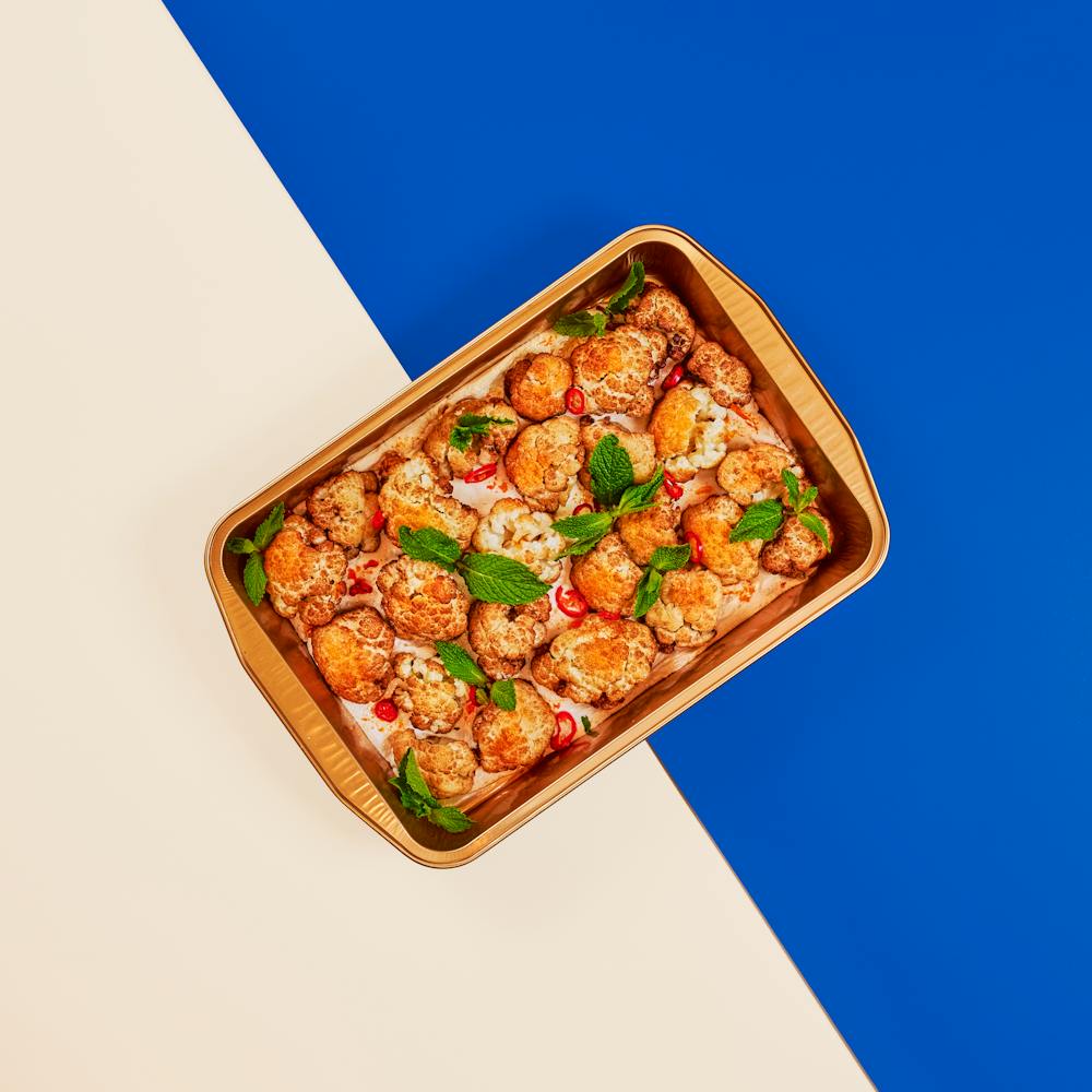 a table topped with different types of food on a plate