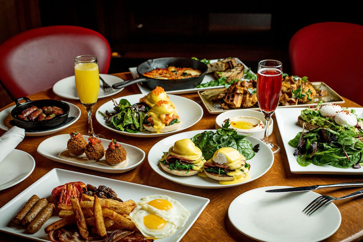 a table topped with plates of food on a plate