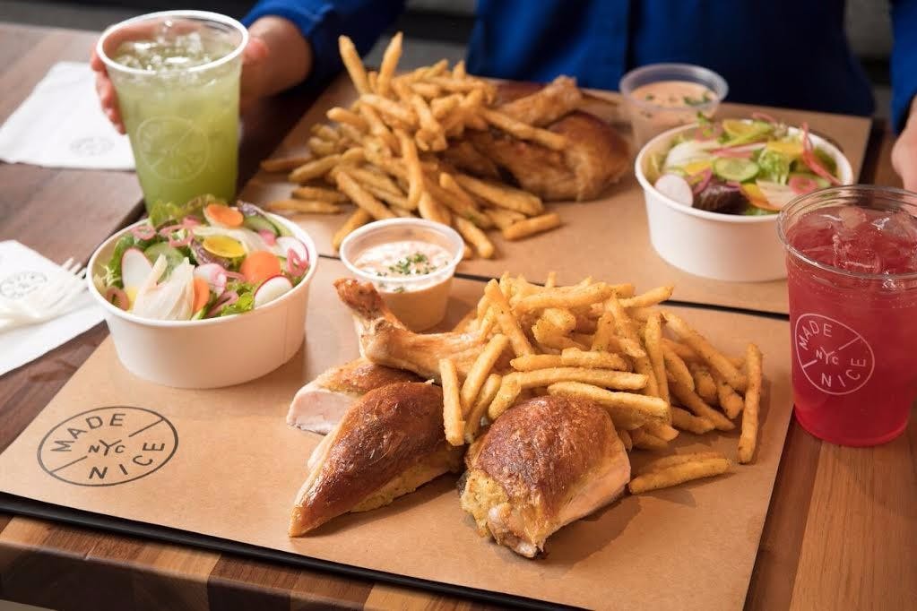 a sandwich sitting on top of a wooden table