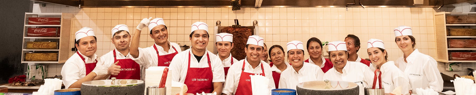 a group of people posing for the camera