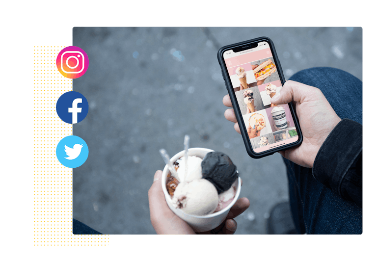 A person holding ice cream and scrolling on the phone