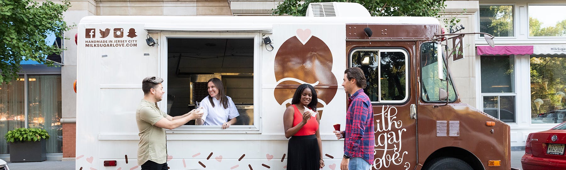 a group of people at an ice cream truck