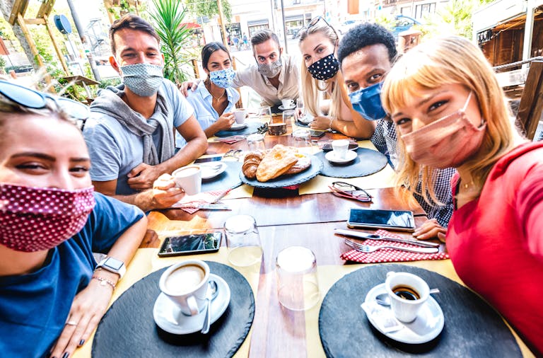 a group of people sitting at a table