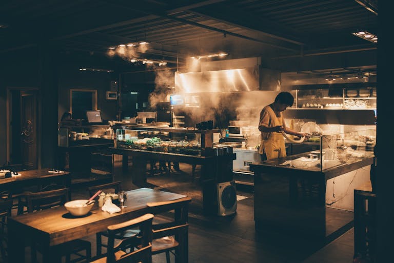 a person cooking in a kitchen
