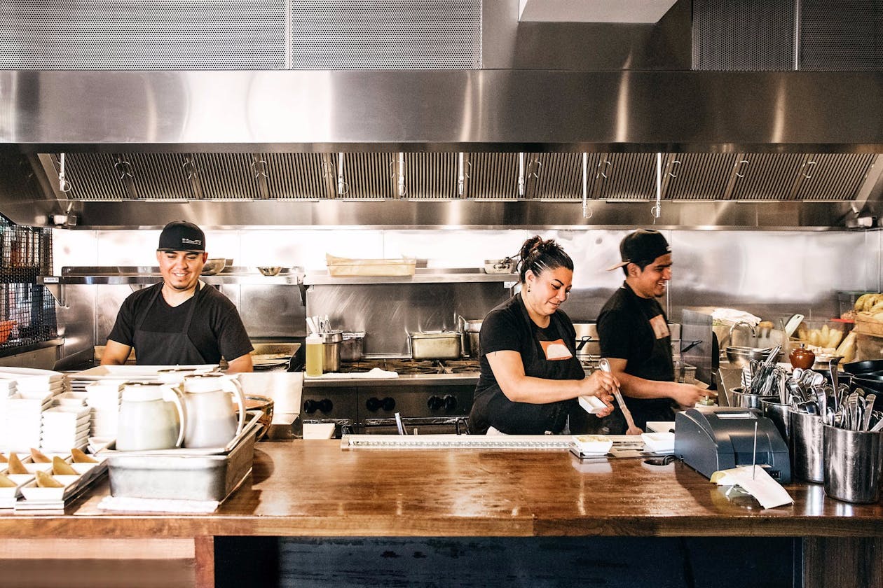 Tacolicious staff prepping some delicious food.