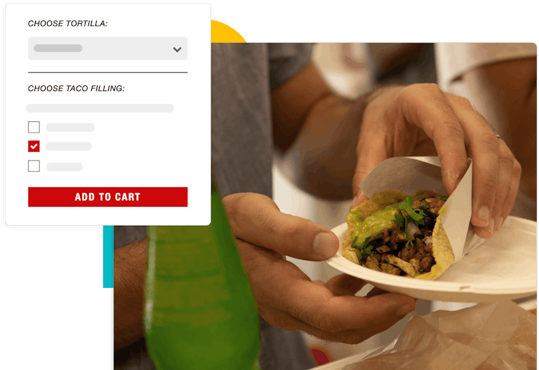 A person holding a taco
