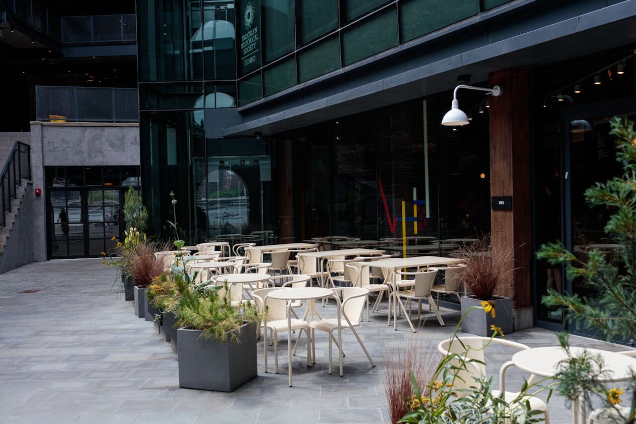 a chair sitting in front of a building
