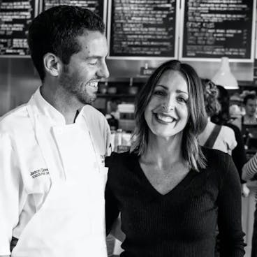 a man and woman posing for a picture