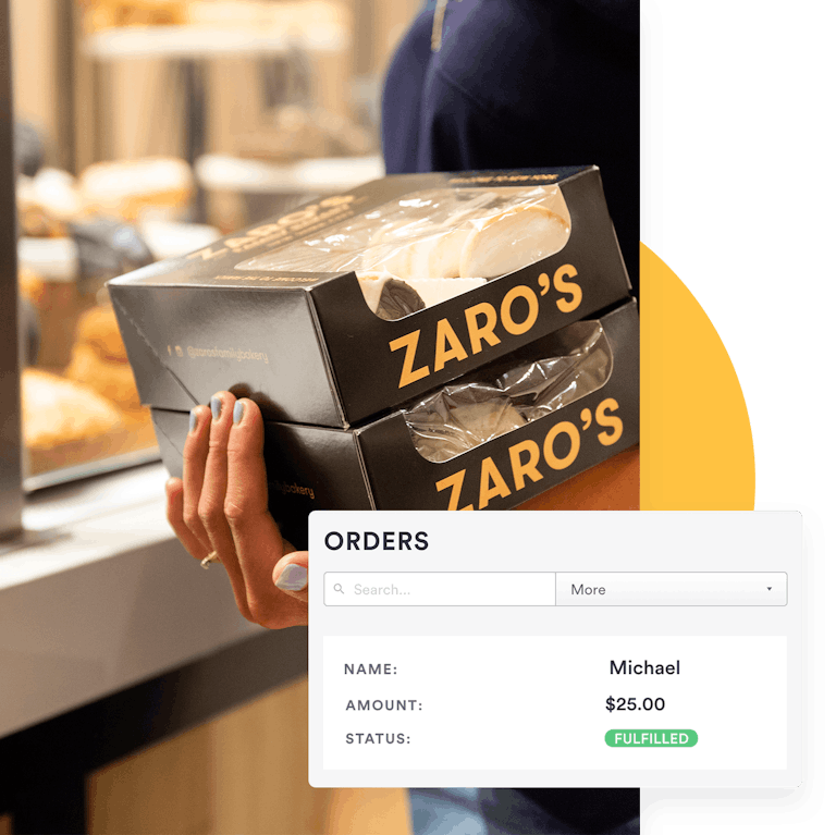 customer holding zaros to-go boxes