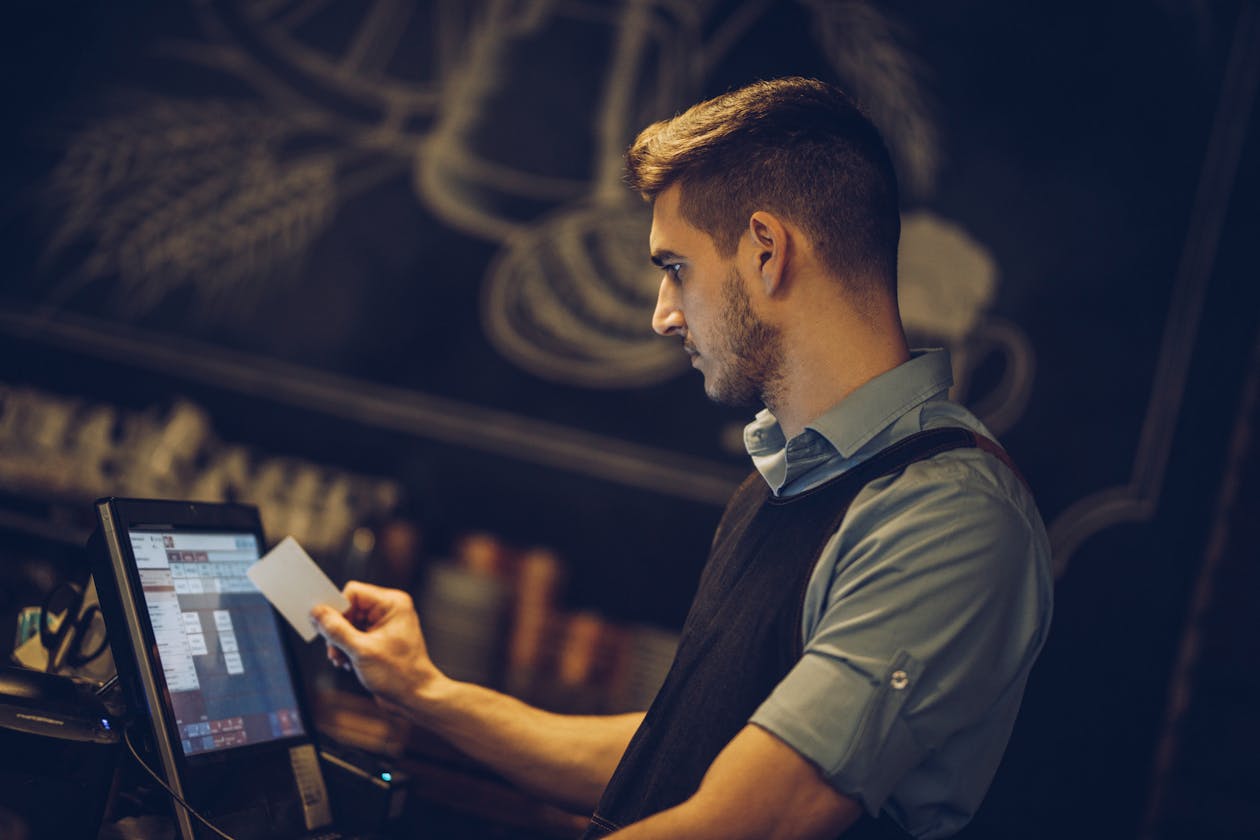 a man holding a laptop