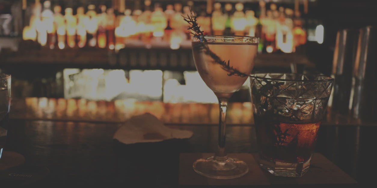 a photo of cocktails on a bar