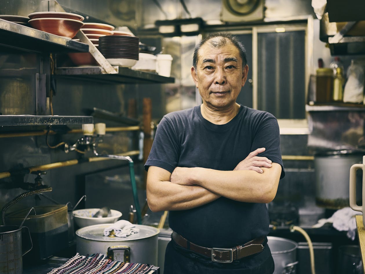 a man standing in a kitchen