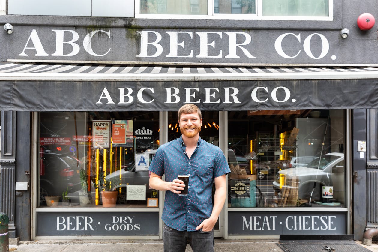 a man standing in front of a store