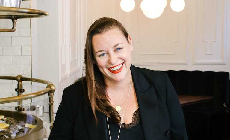 a woman smiling for the camera