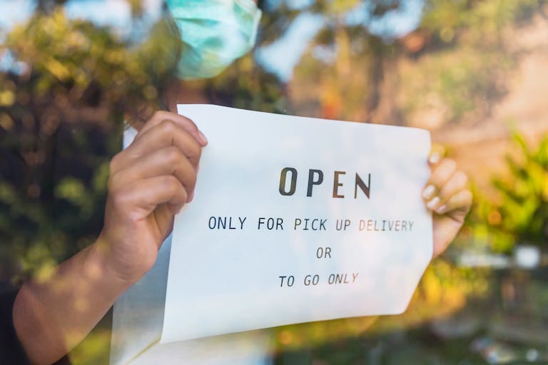 a person holding a sign