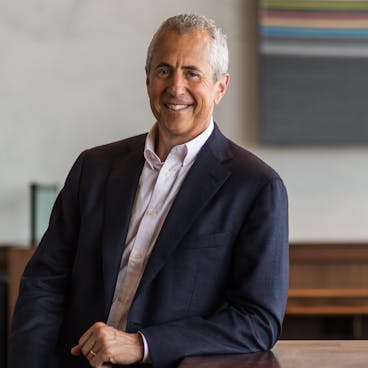 Danny Meyer wearing a suit and tie