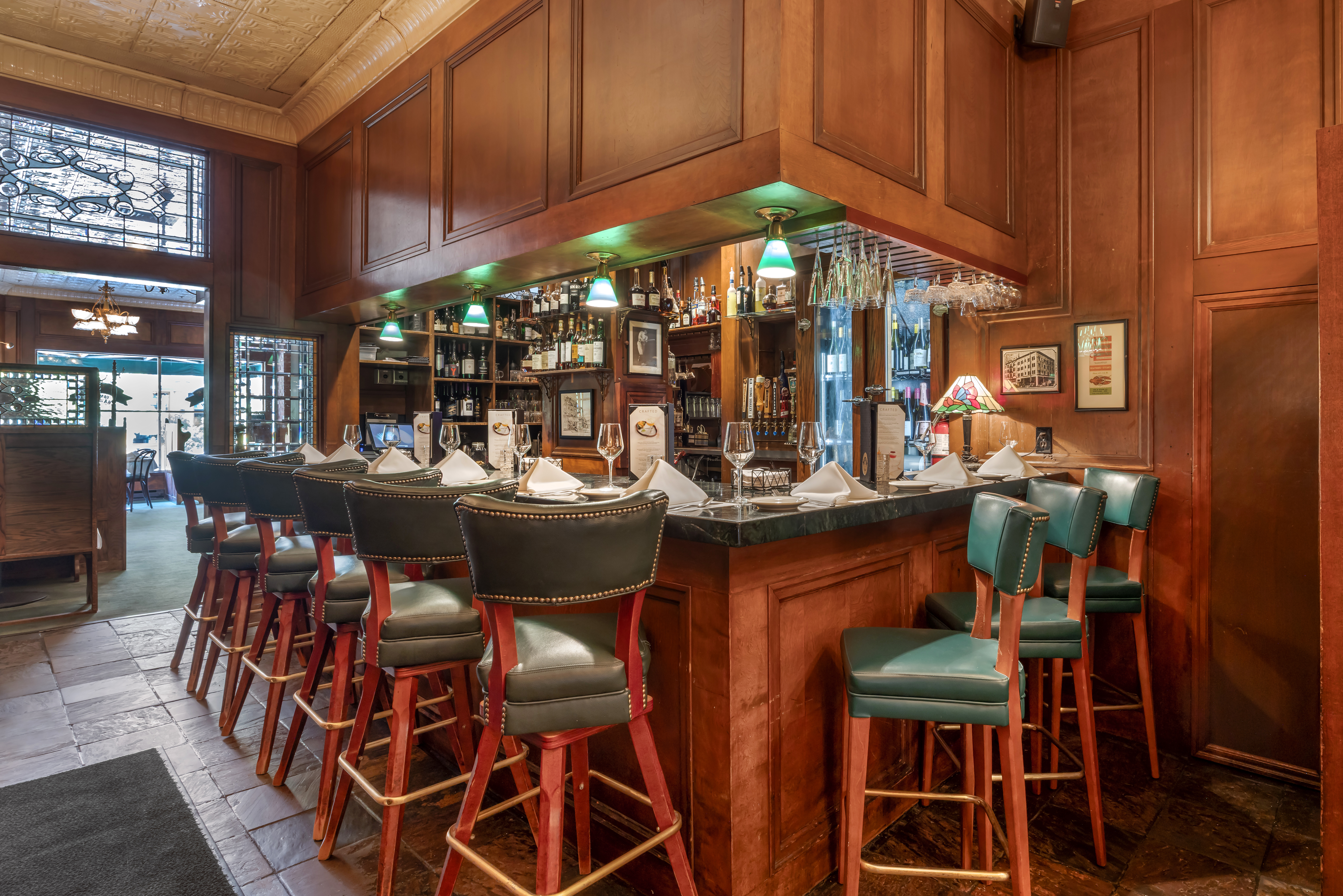 a dining room table in front of a window